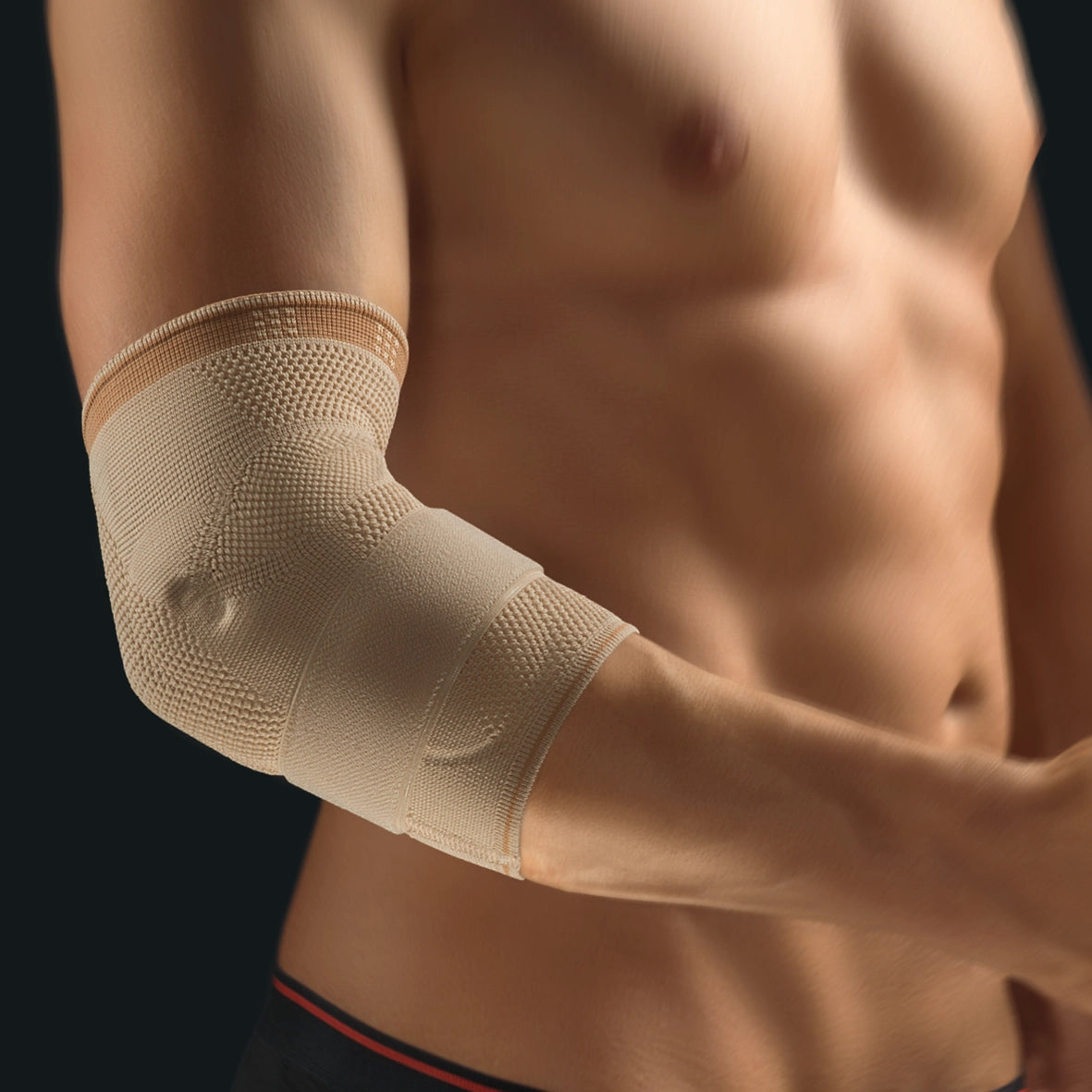 Die Abbildung zeigt die Bort Select EpiPlus Bandage, eine hochwertige Bandage zur gezielten Entlastung und Stabilisierung des Ellenbogengelenks. Sie besteht aus elastischem, atmungsaktivem Material und ist mit zwei speziellen Silikonpelotten ausgestattet, die gezielten Druck auf die Sehnenansätze am Ellenbogen ausüben.