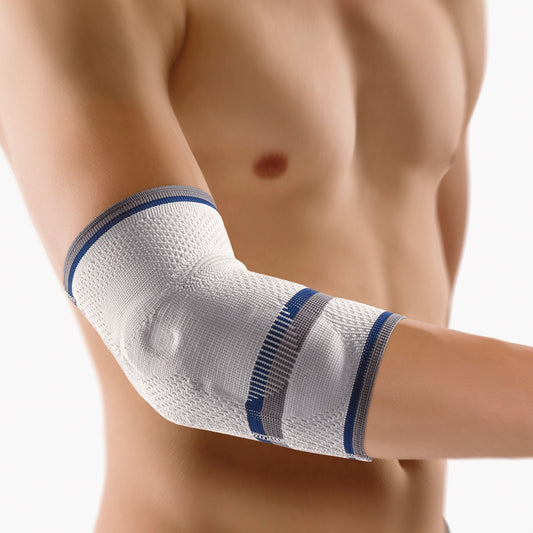 Die Abbildung zeigt die Bort EpiBasic Bandage, eine funktionale Bandage zur Unterstützung des Ellenbogengelenks. Sie besteht aus dehnbarem, atmungsaktivem Material und ist mit einer gezielt platzierte Silikonpelotte ausgestattet, die Druck auf den Ellenbogen ausübt, um Schmerzen zu lindern und die Heilung bei Überlastungen wie Tennisellenbogen oder Golferellenbogen zu fördern.